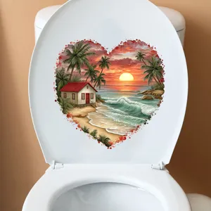 Detailed view of a waterproof heart-shaped beach sunset sticker applied on a clean white toilet lid