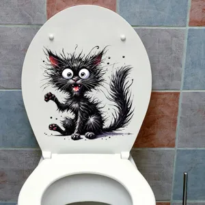 Lustiger schwarzer Katzenaufkleber auf einem Toilettendeckel zur Dekoration