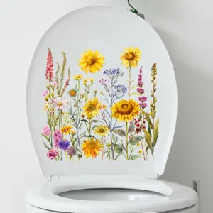 Detailweergave van aquarel zonnebloem en wilde bloemen stickers op een toiletdeksel