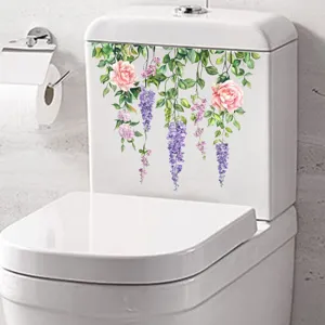 Waterproof floral toilet sticker with pink roses and hanging purple vines in a bathroom.