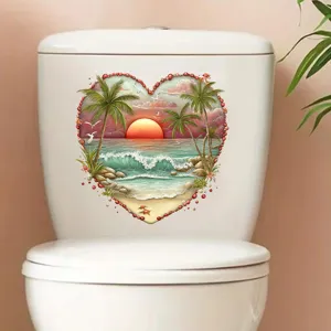 Heart-shaped beach sunset waterproof sticker decal applied on a white toilet tank.