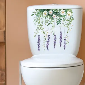 Close-up of floral wisteria and daisy decal applied to a white toilet tank.