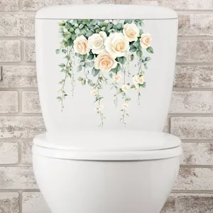 Detail view of floral vine waterproof toilet decal with white roses and green leaves