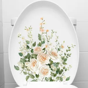 Close-up view of elegant cream rose flower sticker applied on a white toilet lid decoration