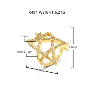 Gedetailleerd beeld van geometrische sterring met afmetingen en messing materiaal.
