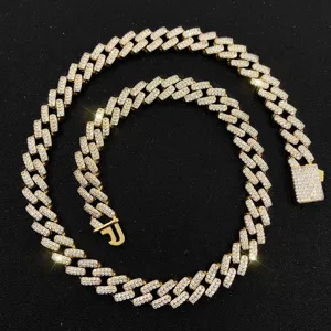 Detailed view of gold plated iced out Cuban link chain with pave zirconia stones
