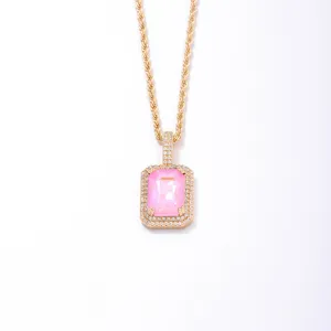 Elegant gold rope chain necklace with a large fluorescent pink square zircon pendant