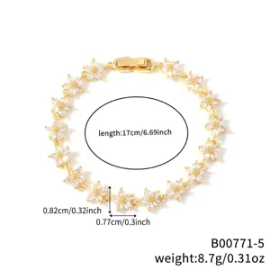 Primo piano del bracciale a stella in zirconia placcato oro con 17 cm e peso