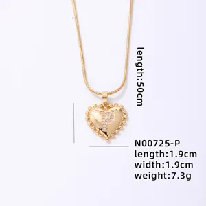 Gold snake chain necklace with beaded heart pendant and crystal letter P for women.