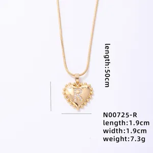 Pendant detail and dimensions of the gold heart letter R necklace with crystal pave.