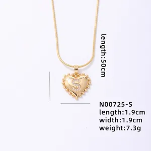 Gold heart letter S pendant necklace with snake chain, stylish minimalist fashion jewelry.