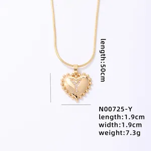 Gold heart letter Y pendant necklace with snake chain, elegant minimalist clavicle jewelry.
