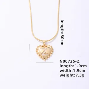 Gold heart letter Z pendant necklace with snake chain, elegant and chic fashion jewelry.
