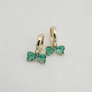 Gold butterfly hoop earrings with sparkling green zirconia stones, elegant sweet style.