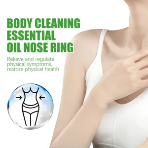 Détail de l'anneau nasal aux huiles essentielles amincissantes montrant l'effet sculptant