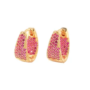Elegant gold-plated U-shaped hoop earrings pave-set with vibrant magenta CZ stones.
