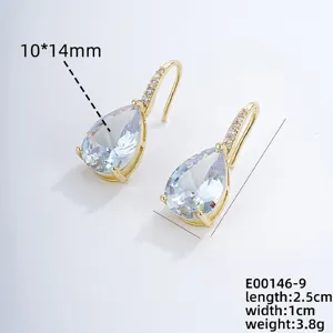 Gold plated pear shaped zircon drop earrings with micro pave stones, elegant design.