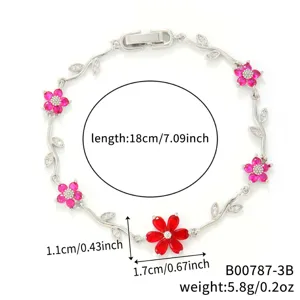 Bracelet floral en cuivre avec pétales en zircone rouge, longueur 18 cm, poids 5,8 g.