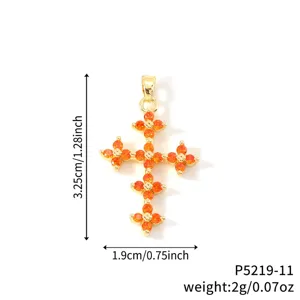 Orange zircon clover cross pendant shown with precise dimensions and 2g weight details
