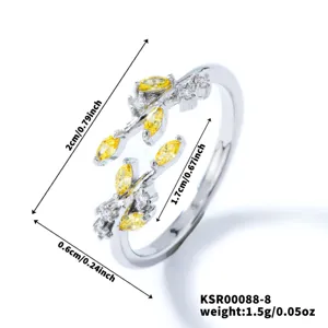 Detailed view of silver-plated leaf open ring with sparkling yellow and white cubic zirconia.