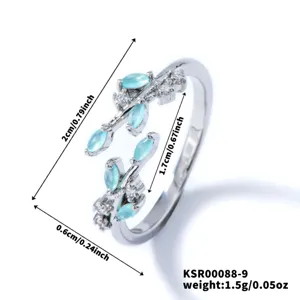 Silver open ring featuring turquoise marquise zircon leaves and sparkling stones, detailed view.