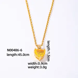 Closeup detail of gold plated heart zircon necklace with dimension and weight specs.