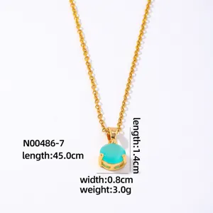 Gold-plated round turquoise pendant necklace detail view showing precise dimensions and fine chain.
