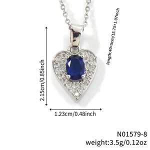Macro detail of heart-shaped blue zircon necklace showing size and weight specifications.