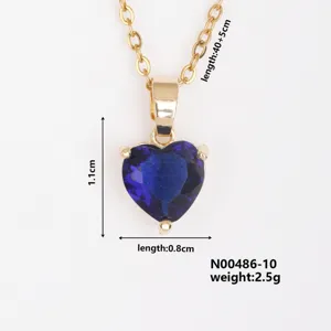 Close-up detail of the gold-plated blue heart cubic zirconia necklace pendant and chain.