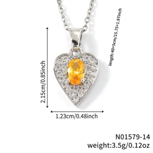 Close-up detail of the heart-shaped pendant necklace showing precise measurements and weight