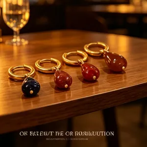 Gold-plated hoop earrings featuring elegant teardrop gemstone pendants for women style.