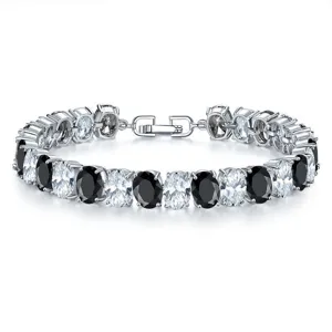 Detail showing alternating black and white oval cubic zirconia stones on a silver bracelet