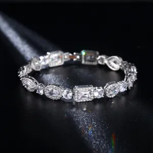 Macro detail of luxury bracelet featuring oval, teardrop and square cubic zirconia