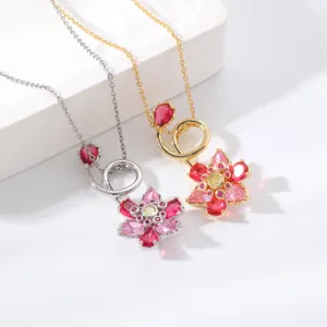 Close-up of exquisite lotus flower pendant necklace with shimmering zircon stones and delicate chain.