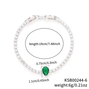 Detailed view of copper inlaid zircon tennis bracelet featuring a green pear-shaped gemstone