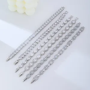 Luxury silver bracelets with sparkling zircon in pear, oval, and rectangular shapes.