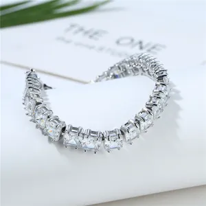 Elegant silver-toned tennis bracelet featuring sparkling square-cut zircons for women.