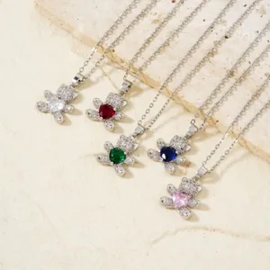 Collection of teddy bear necklaces with sparkling heart-shaped zirconia in five colors