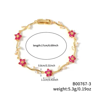 Gold floral zircon bracelet for women, elegant flower charm daily wrist chain jewelry.