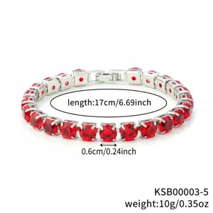 Silver tennis bracelet detailed view featuring sparkling red round zircon stones and secure clasp.