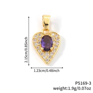 Detailed macro view of gold-plated heart pendant with purple amethyst and zircons