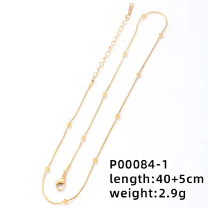 Elegant golden snake chain necklace with small gold beads detail, 40+5cm length and lobster clasp