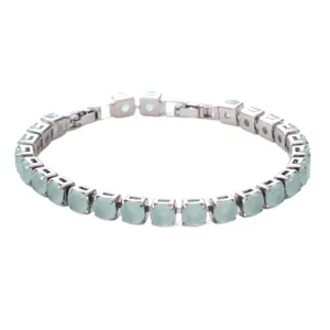 Elegant silver-plated tennis bracelet featuring sparkling light blue round crystals for women.