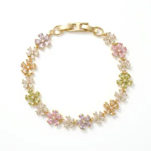 Elegant gold-tone floral bracelet featuring colorful cubic zirconia stones for women