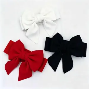Trio of large bow elastic waist belts in white, red, and black colors for women's dresses