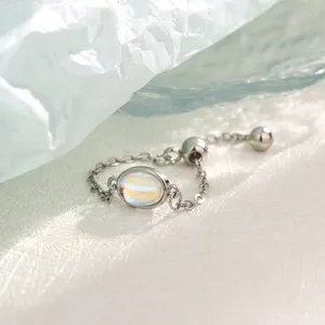 Elegant adjustable moonstone chain ring featuring a creative oval colorful crystal