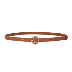 Detail of the elegant brown leather women belt with golden round buckle close up view