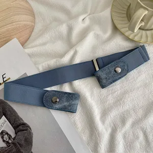 Detail shot of blue elastic invisible belt with denim detail on fabric background and props.