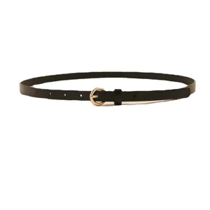 Black thin leather belt detail, golden round buckle closeup, minimalist waist accessory view.