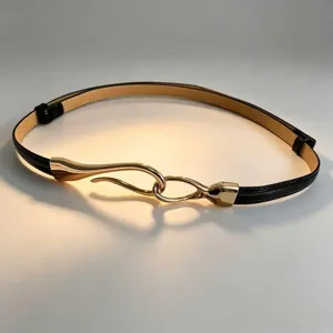 Women's thin black PU leather belt with elegant golden metal hook buckle for daily commute.